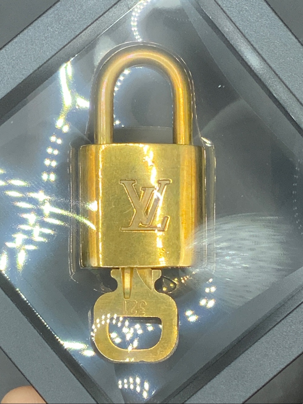 Louis Vuitton Gold-tone LV Padlock Key Holder #321